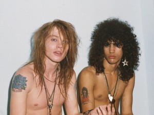 LOS ANGELES - JUNE 28:  (L-R) Axl Rose and Slash of the rock group 'Guns n' Roses' pose for a portrait at the Stardust Ballroom on June 28, 1985 in Los Angeles, California. (Photo by Jack Lue/Michael Ochs Archives/Getty Images)
